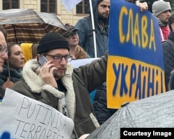 Андрей Садчиков на митинге в Германии